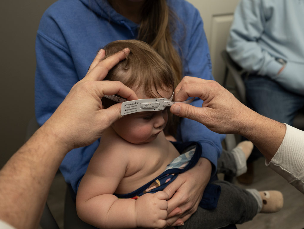 child being measured